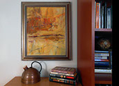 Abstract Expressionist painting Mountain Pass by artist Susan Ray Euler photographed in room setting.