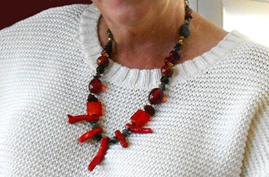 Slide show of Red Coral and Glass necklace by artist Susan Euler.